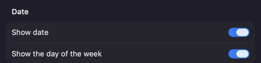 The Date section of Clock Options in System Settings on macOS 27, with two switches, Show date and Show the day of the week, both on